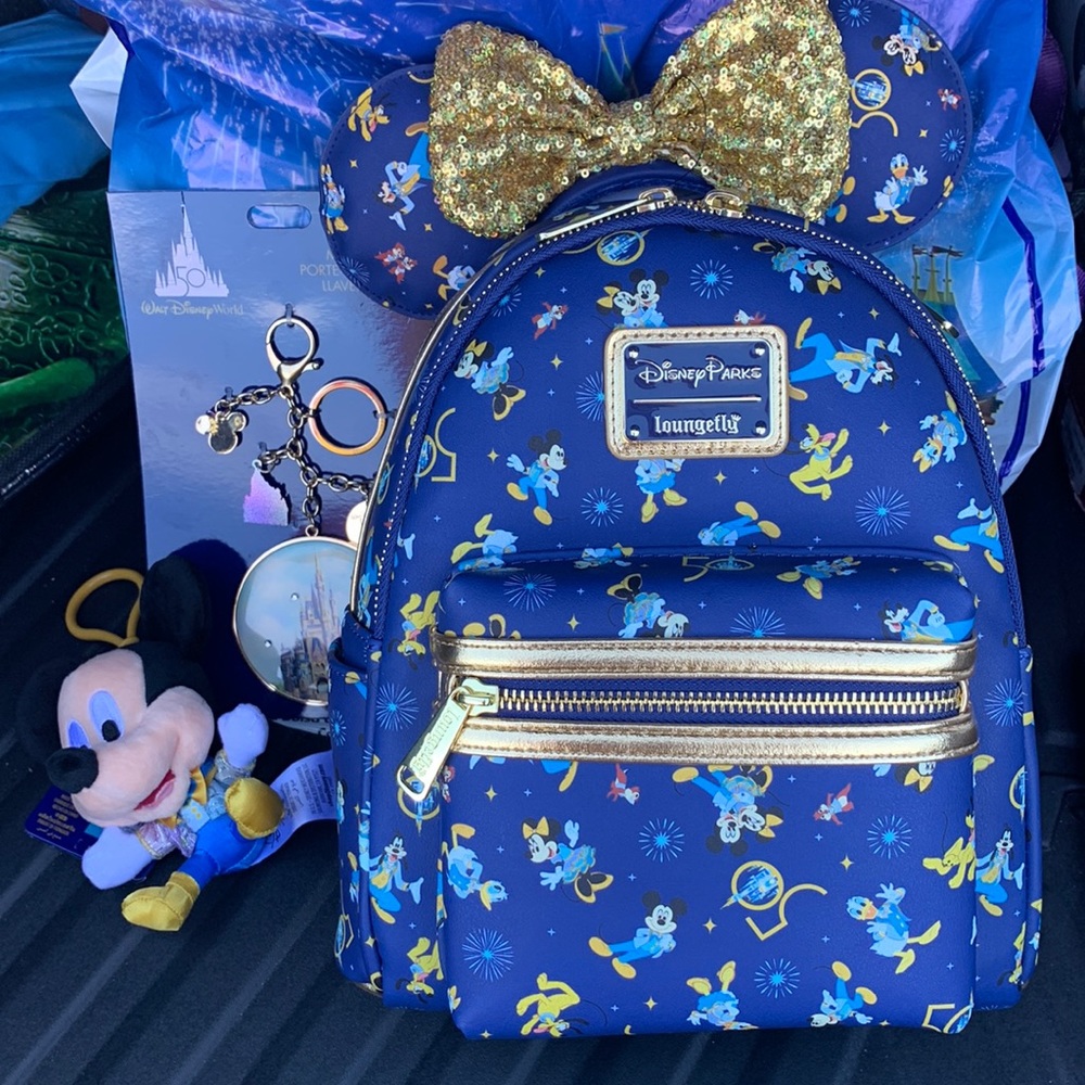 Disney 50th loungefly bag, ears, 2 bag charms. NWT